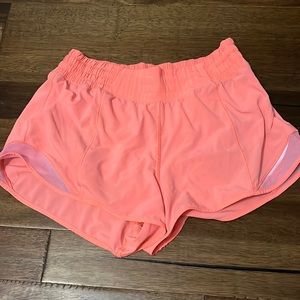 ORANGE HIGHRISE LULULEMON SHORTS 2.5 inch
